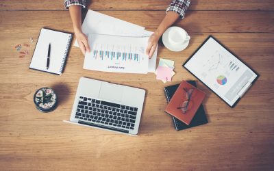 Top view of young Businessman woman hands reviewing analyzing f desk working