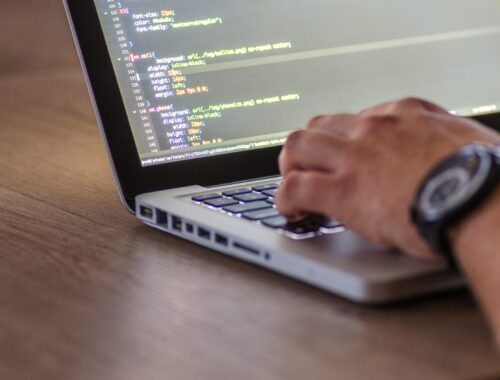 Man working on laptop in office